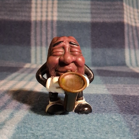 Other - Vintage California RASIN Man Playing Saxophone 1987